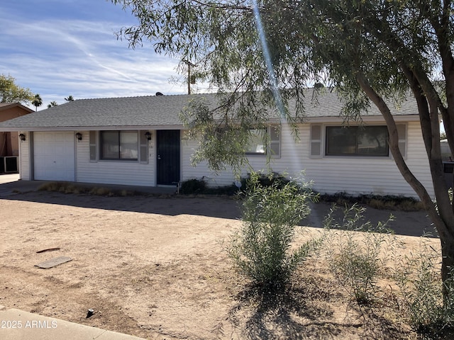 ranch-style house featuring a garage