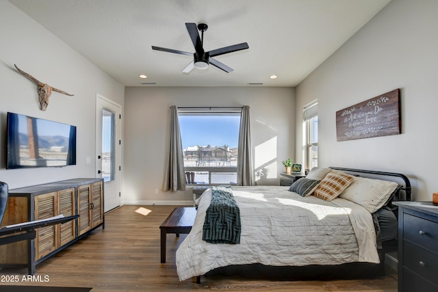 bedroom with ceiling fan, recessed lighting, wood finished floors, and baseboards