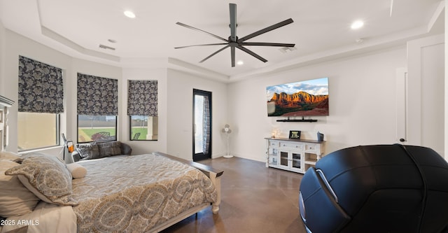 bedroom featuring recessed lighting, visible vents, a raised ceiling, and concrete floors