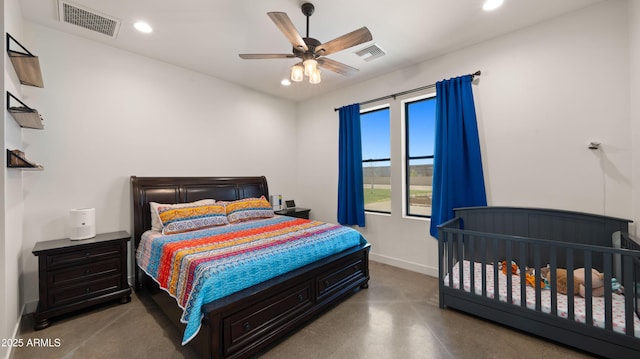 bedroom featuring recessed lighting, visible vents, baseboards, and finished concrete flooring