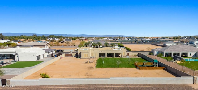 drone / aerial view with a mountain view and a residential view