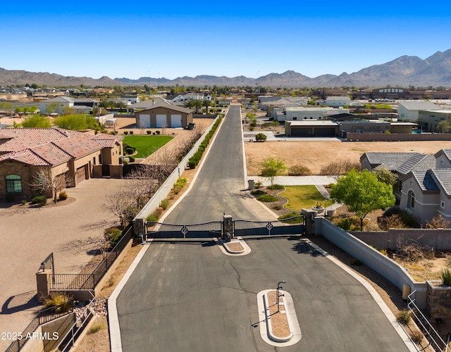 aerial view featuring a residential view and a mountain view