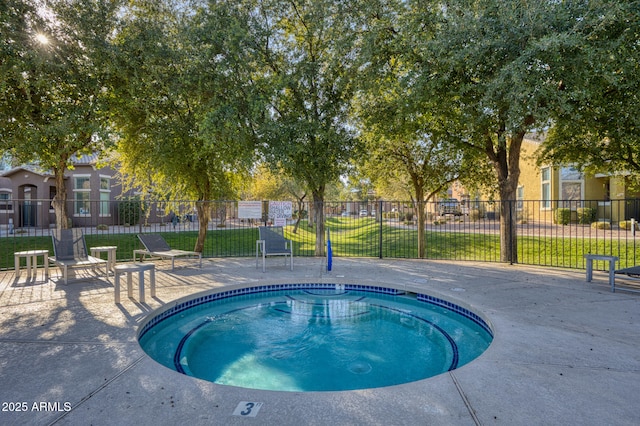 view of swimming pool with a community hot tub and a patio