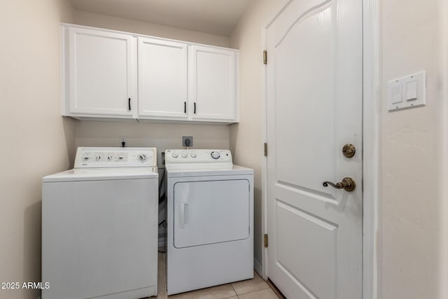 5830 E Mckellips Rd Unit 101, Mesa, AZ 85215 - laundry room with cabinet space, washer and dryer, and light tile patterned flooring