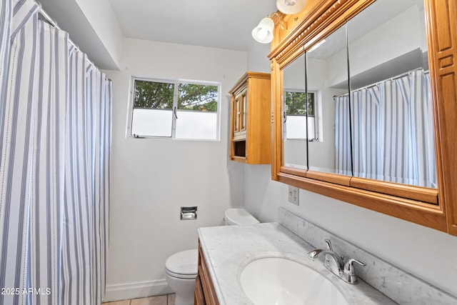 full bathroom featuring vanity, toilet, a shower with shower curtain, and tile patterned flooring