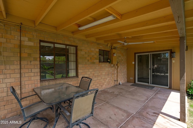 view of patio / terrace featuring ceiling fan