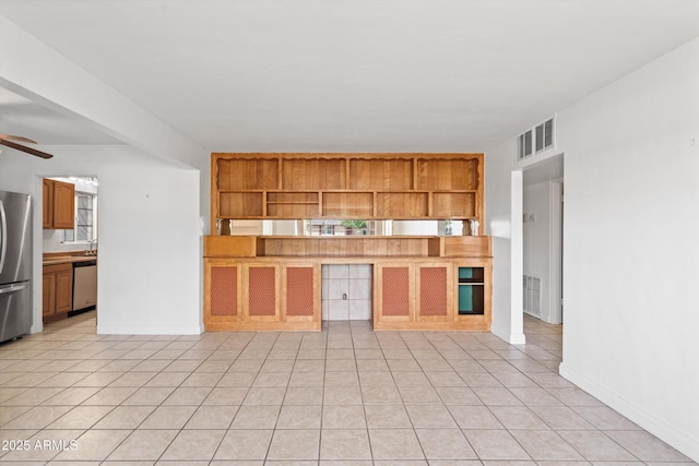 kitchen with light tile patterned floors, stainless steel appliances, open shelves, and a ceiling fan