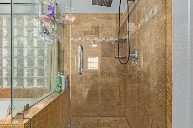 bathroom with independent shower and bath