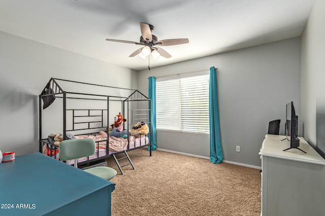 carpeted bedroom featuring ceiling fan