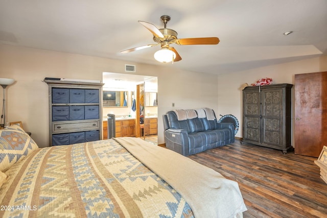 bedroom featuring vaulted ceiling, ceiling fan, and dark hardwood / wood-style flooring