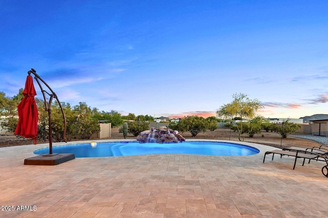 103 W Tanya Rd, Phoenix, AZ 85086 - pool at dusk featuring a patio and an outdoor pool
