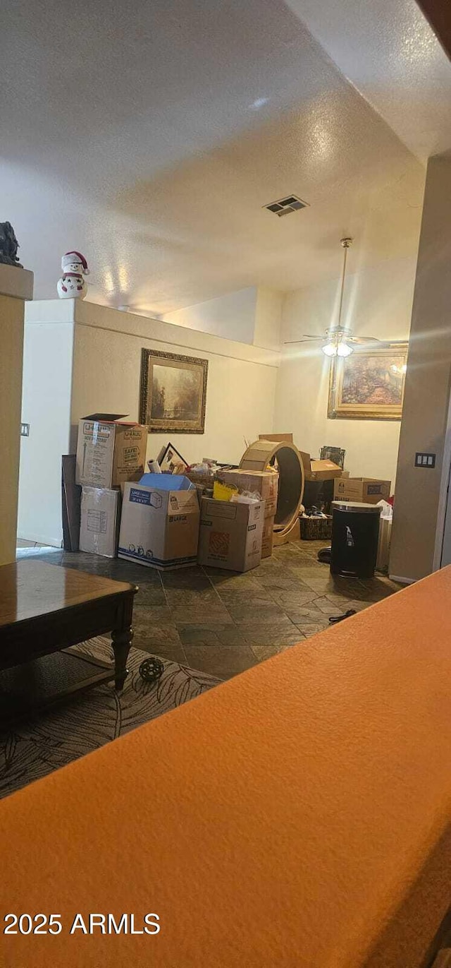 living room featuring visible vents
