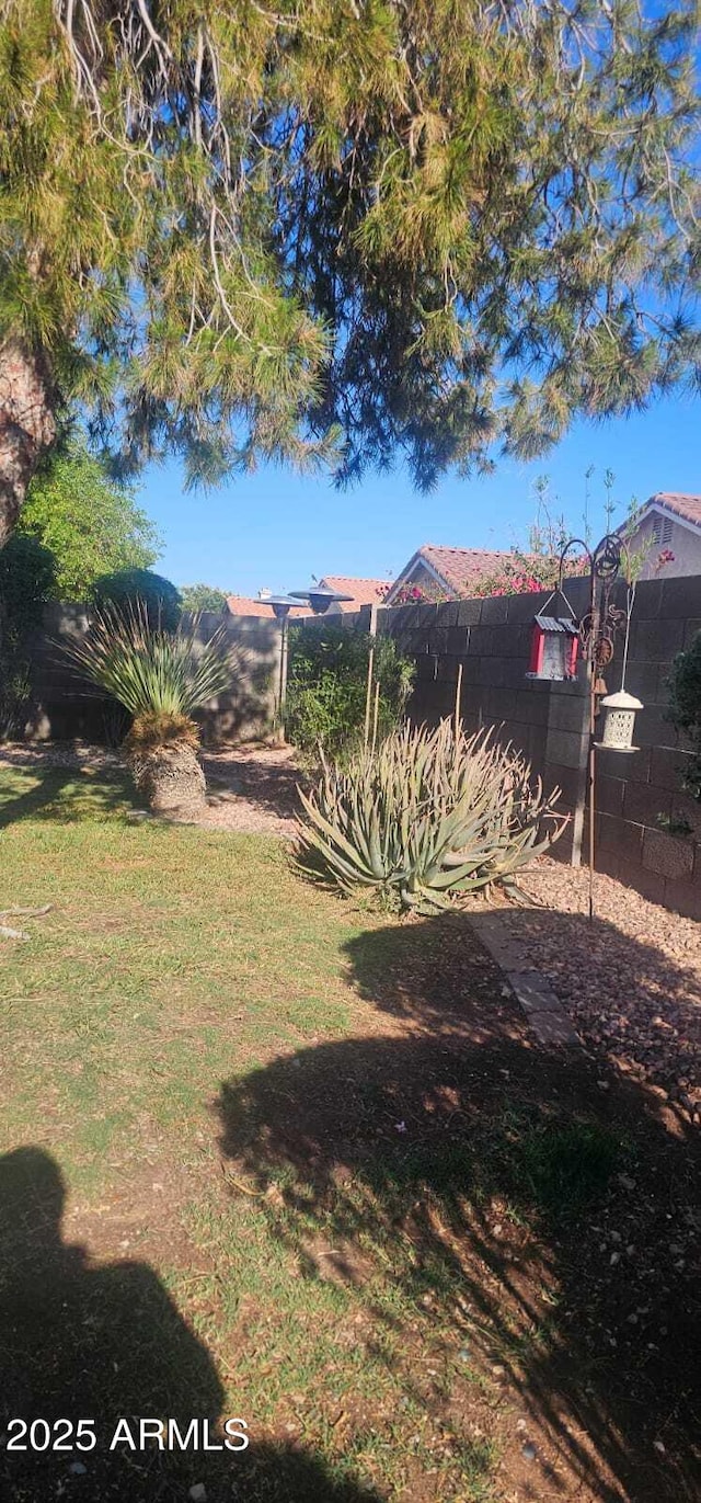 view of yard featuring fence