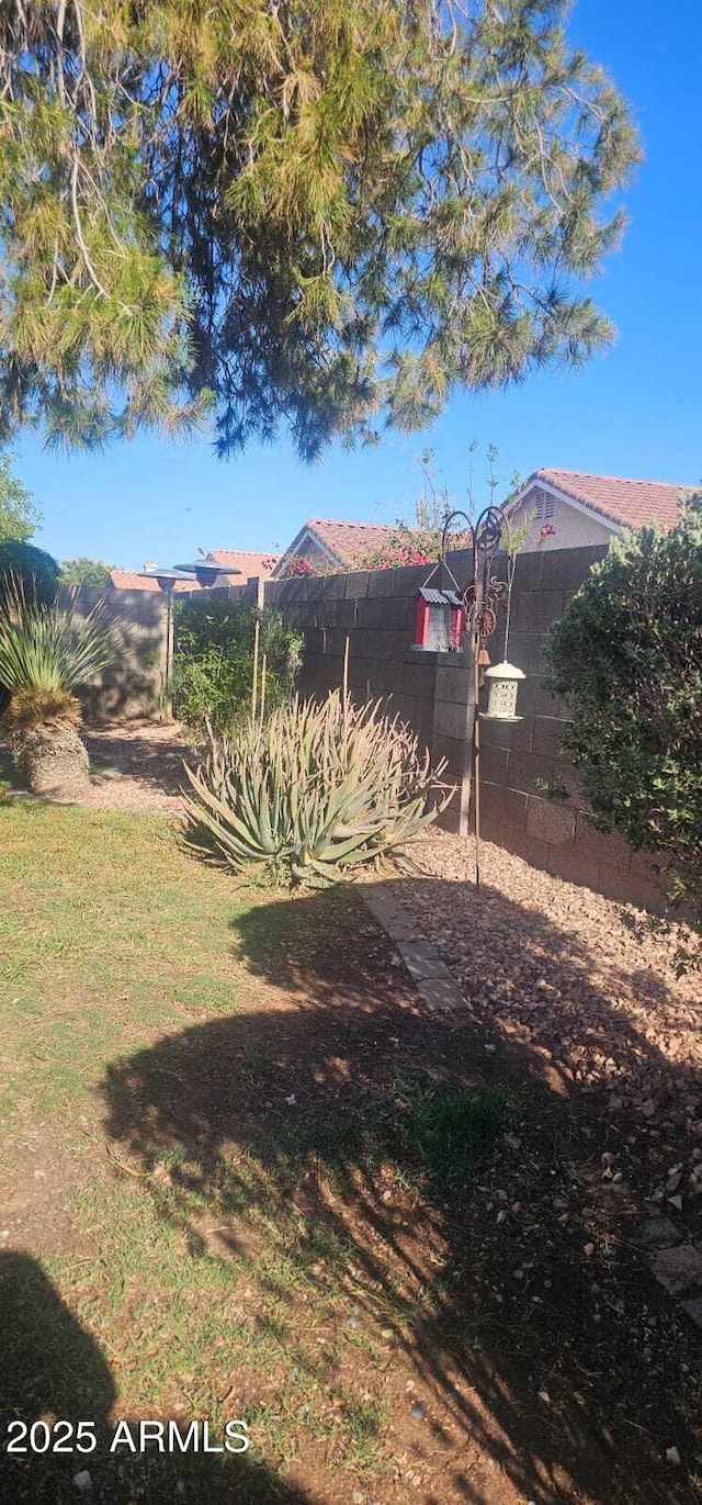 view of yard with fence