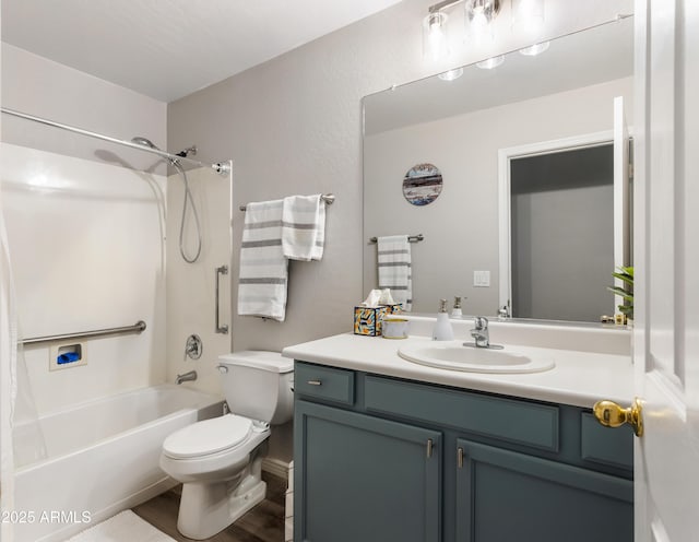 full bathroom with washtub / shower combination, toilet, and vanity