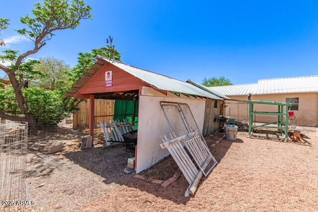 101 E Safford St, Tombstone, AZ 85638 - view of outbuilding featuring an outdoor structure and fence