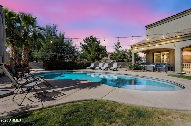 21266 S 213th Pl, Queen Creek, AZ 85142 - pool at dusk featuring a patio area