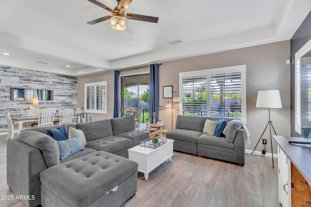 21266 S 213th Pl, Queen Creek, AZ 85142 - living area featuring ceiling fan, an accent wall, baseboards, wood finished floors, and recessed lighting
