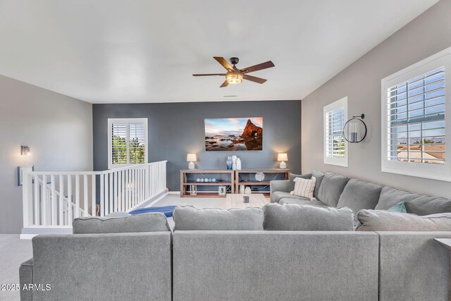 21266 S 213th Pl, Queen Creek, AZ 85142 - living room featuring ceiling fan, carpet, baseboards, and an accent wall