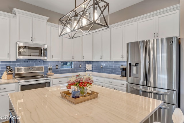21266 S 213th Pl, Queen Creek, AZ 85142 - kitchen featuring appliances with stainless steel finishes, white cabinetry, decorative backsplash, and light stone counters