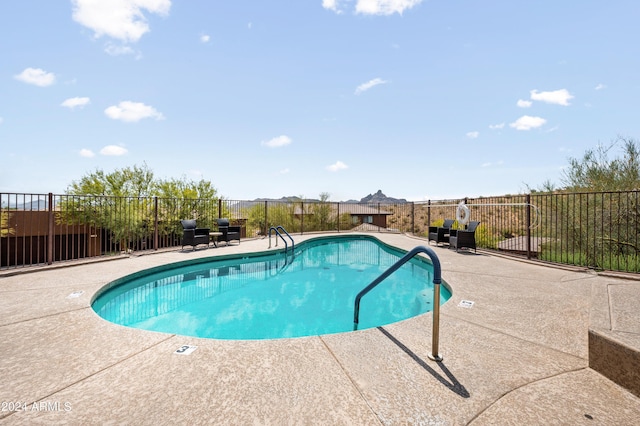 view of pool with a patio