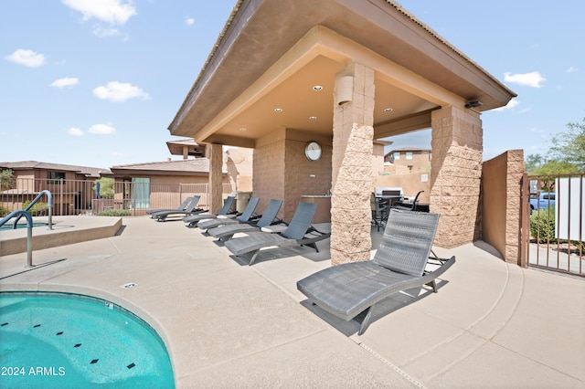 view of pool featuring a patio area