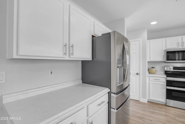 3349 E Flamingo Ct, Gilbert, AZ 85297 - kitchen featuring stainless steel appliances, white cabinetry, light countertops, and recessed lighting