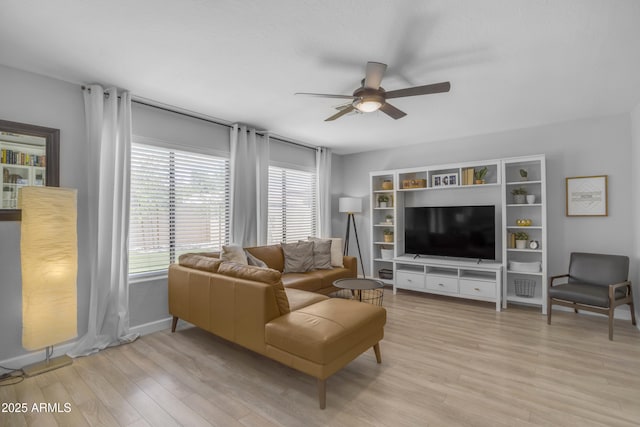 3349 E Flamingo Ct, Gilbert, AZ 85297 - living room with a ceiling fan, light wood-style floors, and baseboards