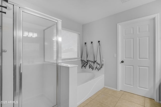 3349 E Flamingo Ct, Gilbert, AZ 85297 - bathroom featuring a shower stall, a garden tub, and tile patterned floors