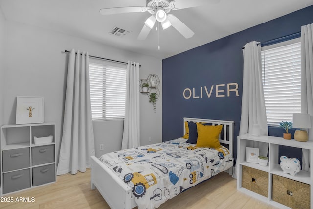3349 E Flamingo Ct, Gilbert, AZ 85297 - bedroom featuring wood finished floors and ceiling fan