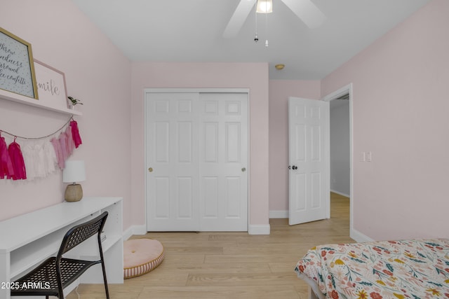3349 E Flamingo Ct, Gilbert, AZ 85297 - bedroom featuring wood finished floors, baseboards, a closet, a desk, and a ceiling fan