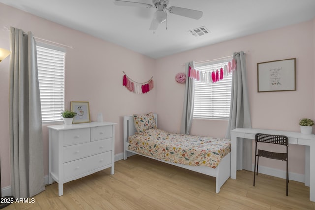 3349 E Flamingo Ct, Gilbert, AZ 85297 - bedroom with light wood-style floors, baseboards, and a ceiling fan