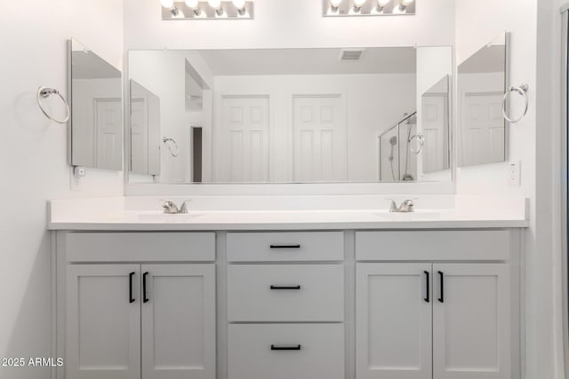 bathroom featuring vanity and walk in shower