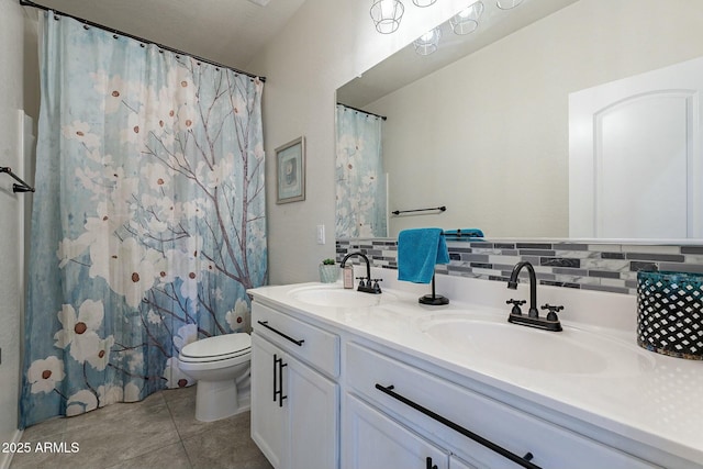 bathroom featuring tasteful backsplash, tile patterned floors, toilet, vanity, and a shower with shower curtain