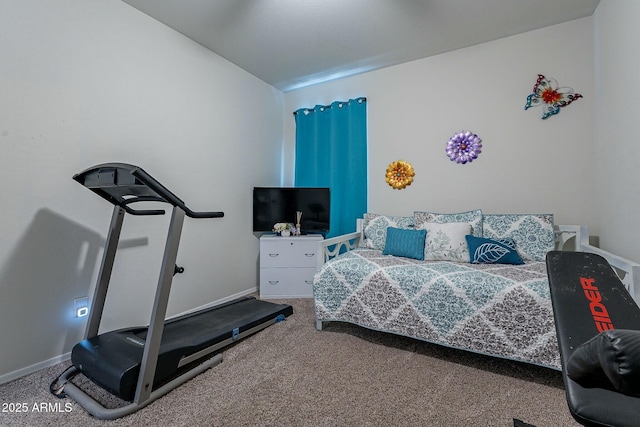 bedroom featuring carpet and vaulted ceiling