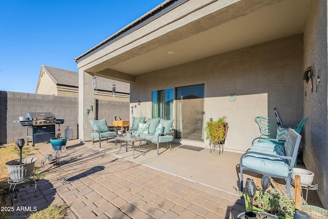 view of patio / terrace featuring outdoor lounge area and grilling area