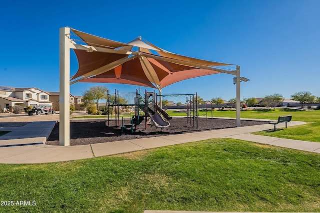 view of jungle gym with a lawn