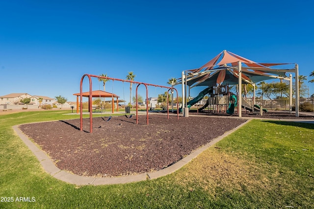 view of playground with a yard