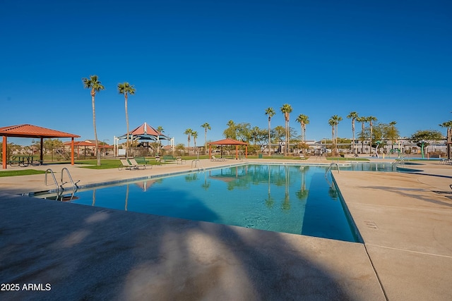 view of pool featuring a gazebo and a patio