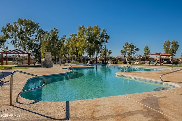 view of pool featuring a gazebo and a patio