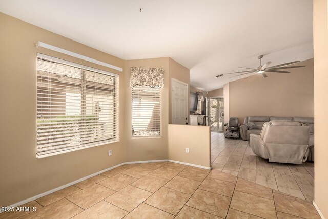 1347 E Vernoa St, San Tan Valley, AZ 85140 - living area featuring lofted ceiling, baseboards, light tile patterned flooring, visible vents, and a ceiling fan