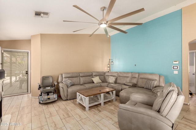 1347 E Vernoa St, San Tan Valley, AZ 85140 - living area with wood tiled floor, visible vents, and a ceiling fan