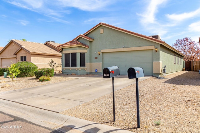 1347 E Vernoa St, San Tan Valley, AZ 85140 - view of front of house with driveway, a garage, a tile roof, stucco siding, and cooling unit
