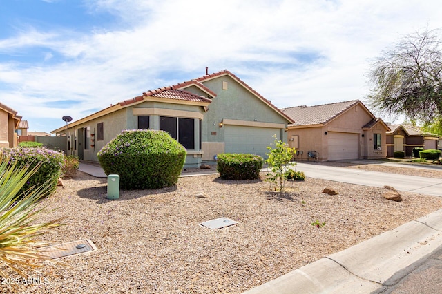 1347 E Vernoa St, San Tan Valley, AZ 85140 - ranch-style house featuring a tiled roof, driveway, stucco siding, and an attached garage