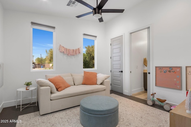 2225 E Whitton Ave E, Phoenix, AZ 85016 - living room featuring visible vents, baseboards, and ceiling fan