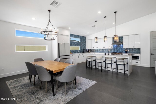 2225 E Whitton Ave E, Phoenix, AZ 85016 - dining space with baseboards, a notable chandelier, visible vents, and recessed lighting