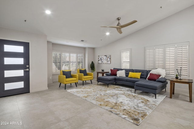 living room with vaulted ceiling and ceiling fan