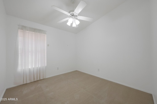 19007 N 79th Dr, Glendale, AZ 85308 - empty room with light colored carpet, lofted ceiling, ceiling fan, and healthy amount of natural light