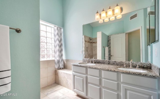 full bathroom with a sink, visible vents, and plenty of natural light