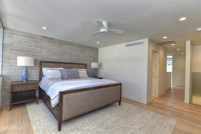 4411 N 40th St N Unit 37, Phoenix, AZ 85018 - bedroom with wood finished floors, a ceiling fan, and recessed lighting